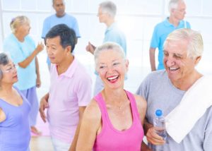 Older adults chatting after a workout session