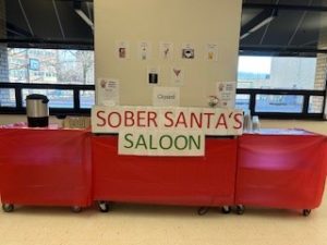 Sober Santa's Saloon table at the holiday party 2023