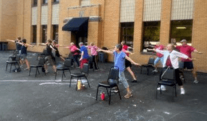 Older adults doing yoga outside