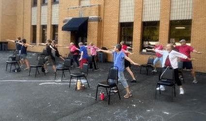 Older adults in a yoga class at EAAS